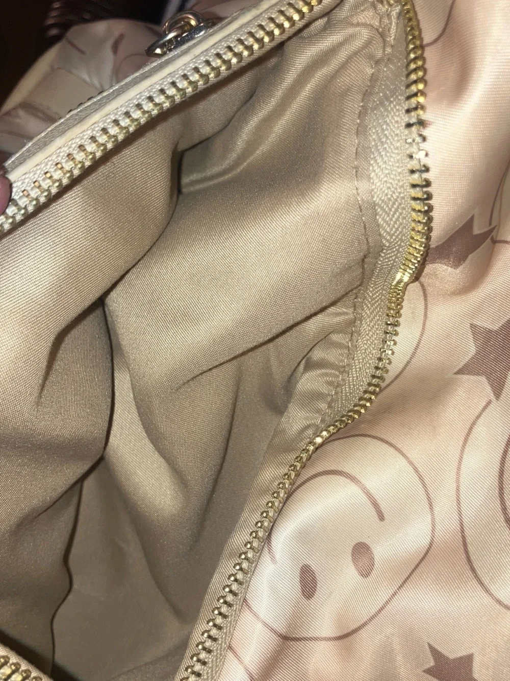 Madden NYC smiley faced back pack with gold hardware , beige & brown 9 pockets z